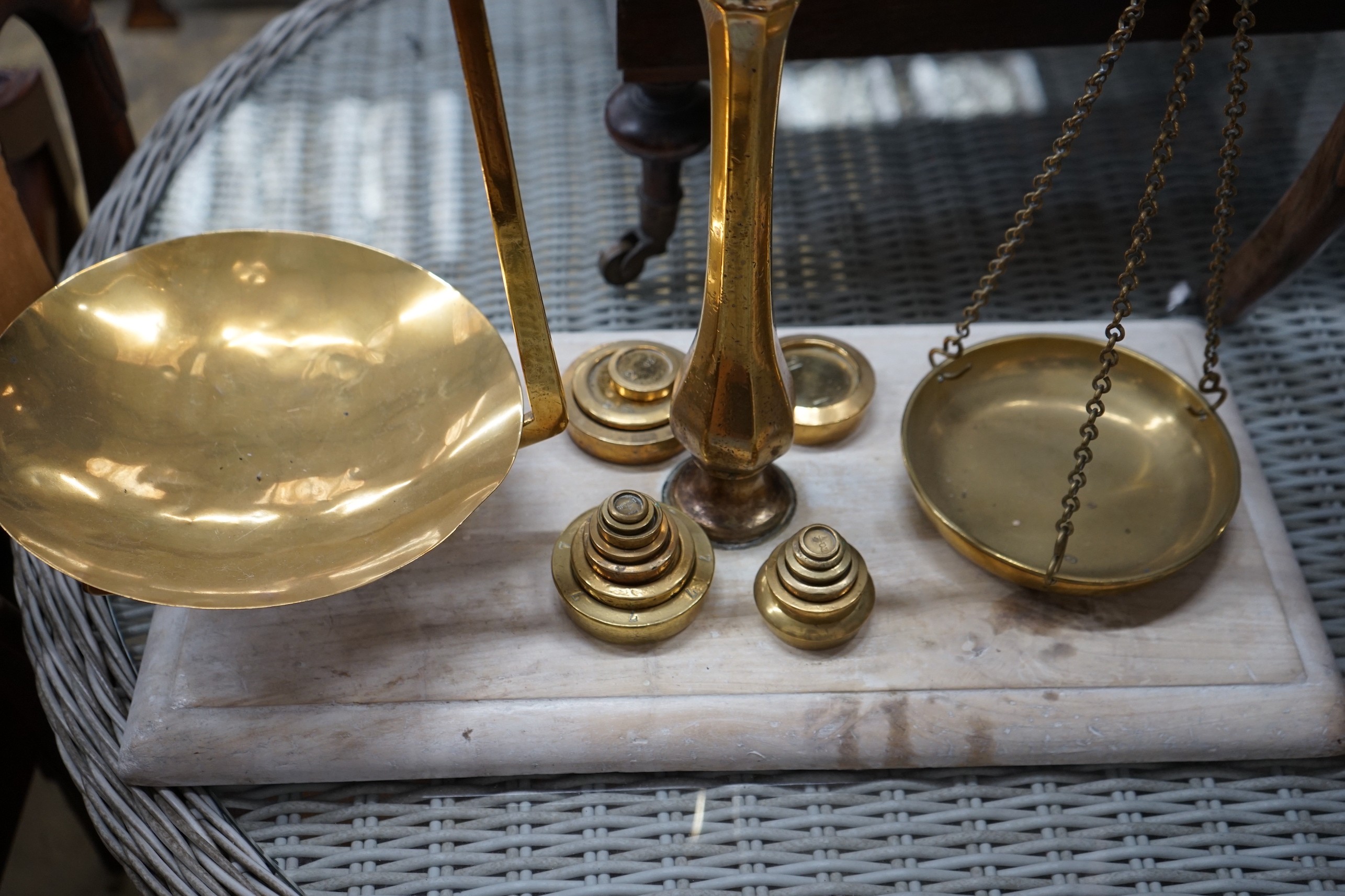 A set of Victorian brass balance scales with weights, height 69cm